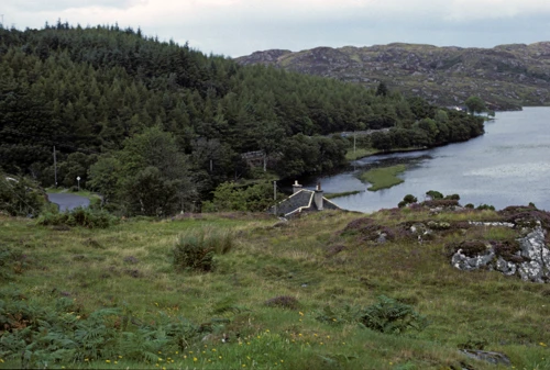 Loch Culag from the top of the hill near Strathan, descending to Lochinver; the primary school sits on its edge.