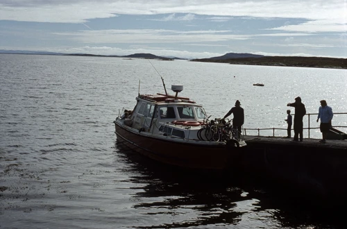 Ferryman Mr McAskell loading our bikes at Newtonferry, North Uist.