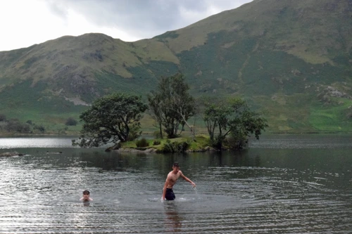 Jude and George swim back from Woodhouse Island to shore, Crummock Water