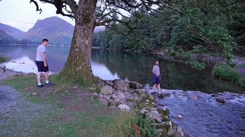 Tao attempts to cross Buttermere Dubs to reach the waterfall