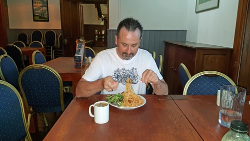 Tao tucks into dinner at Langdale YHA.