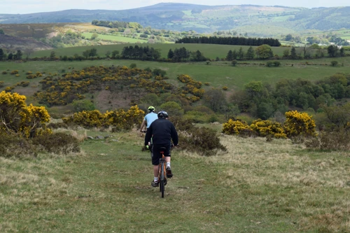 Dropping over the open moor towards Chalk Ford, with the old deer farm opposite.