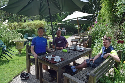 Coffees and cakes under the sunshade at Hill House Garden Centre, Landscove.