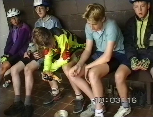 Sheltering in the porch, the warden's secret device fends off midges.