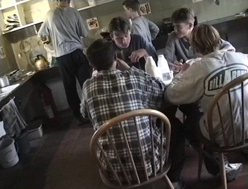 Supper in the cosy kitchen/dining/common room at Bryn Poeth Uchaf youth hostel.