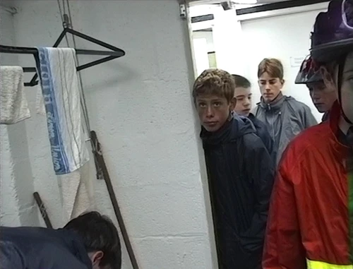 It's raining and everyone has been staying dry in the covered area behind Bryn Poeth Uchaf hostel, but now, unfortunately, we really have to start cycling