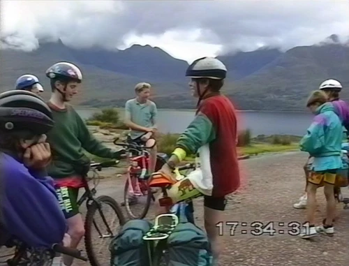 The group rests, Torridon now in sight.