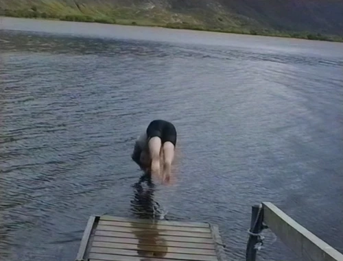 Jon Burgess dives in first—back out within twenty seconds.