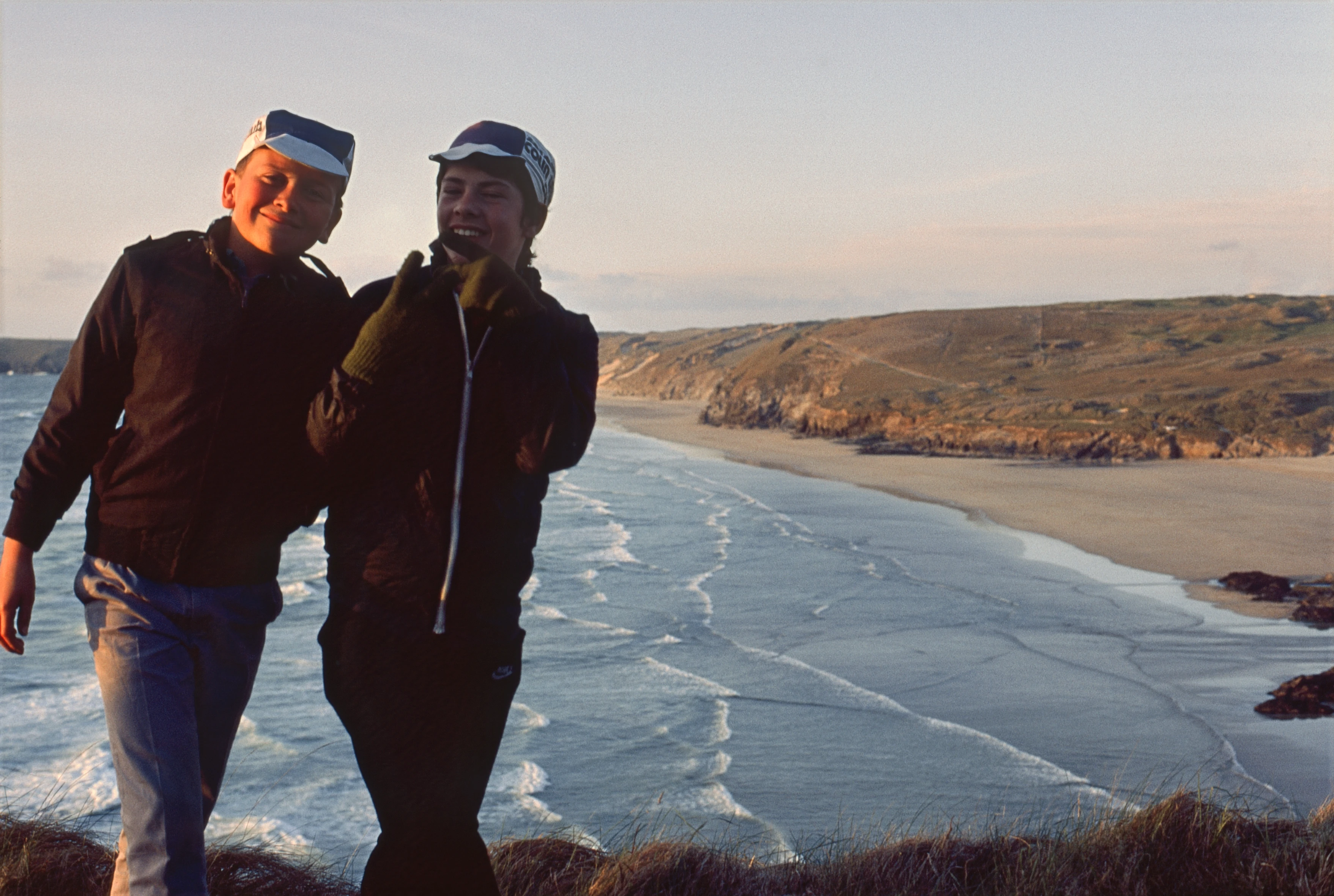 Start of our evening excursion to Perranporth beach from the hostel: Mark and Gary by the entrance driveway to the youth hostel at sunset, overlooking the beach