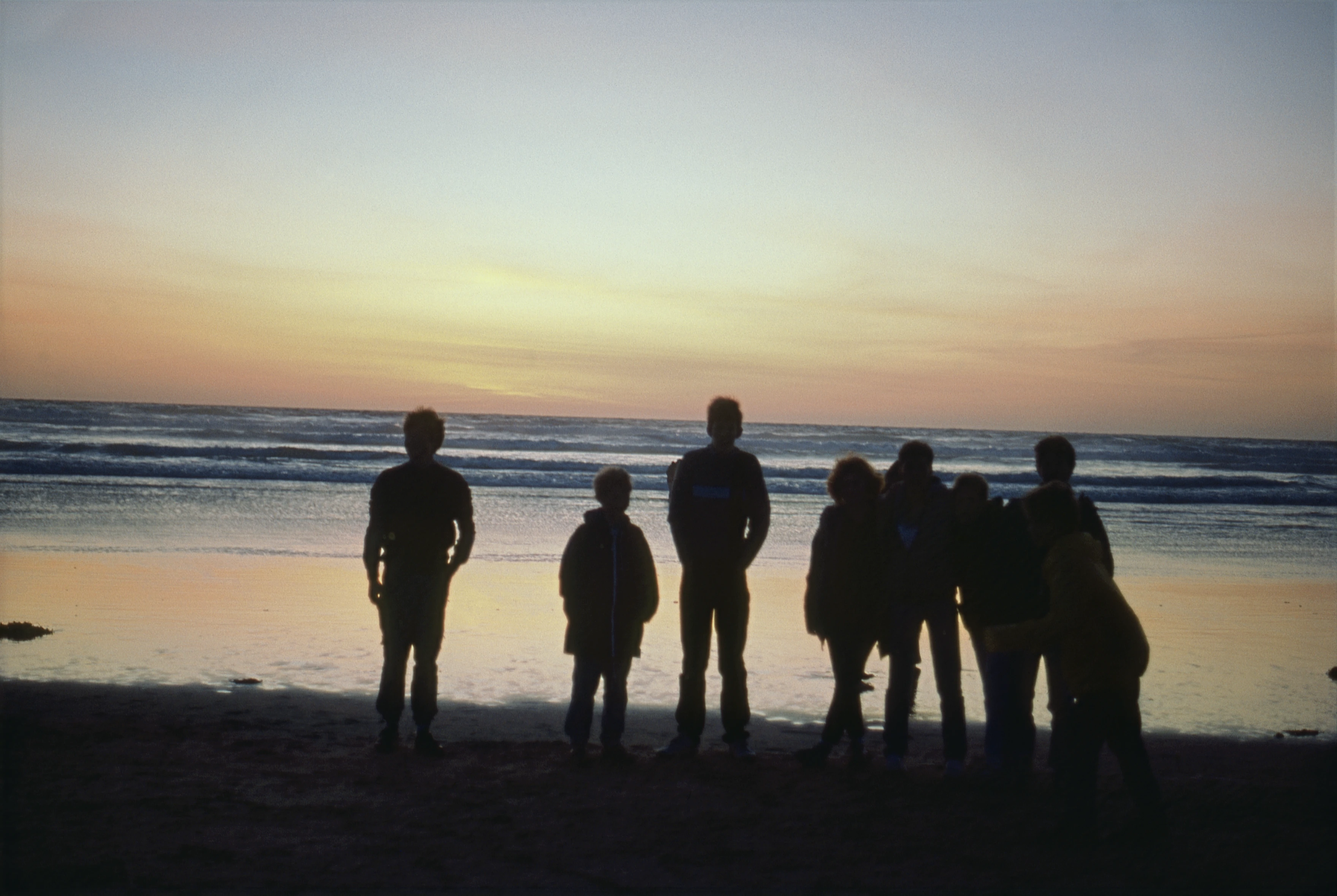 The group contemplating the beauty of Perranporth Beach at sunet