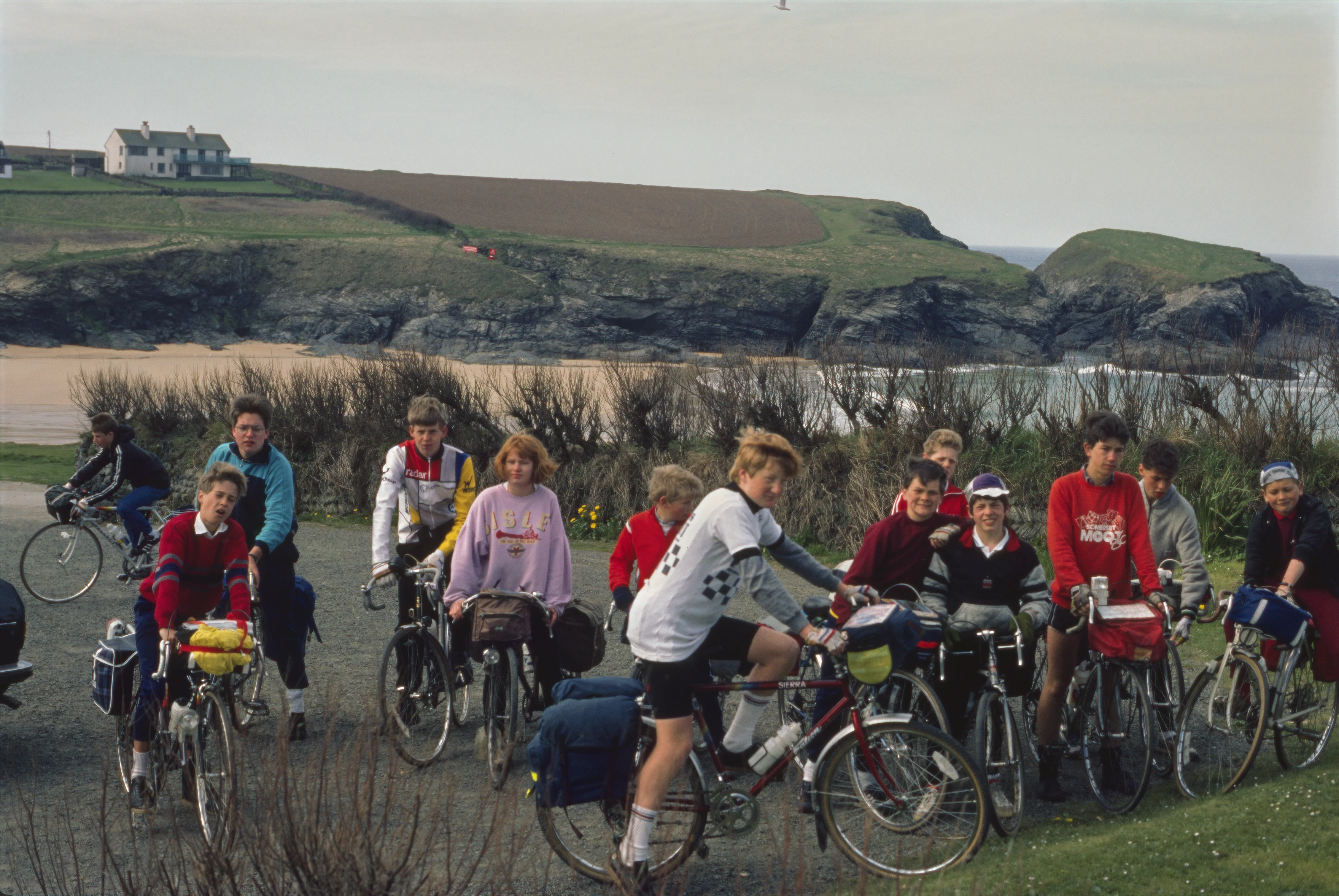The group with Treyarnon Bay behind, ready to leave the hostel