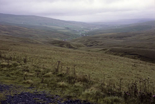 26 Aug 1987 · Looking back to Teesdale from Harwood Common summit in very wet, windy conditions.