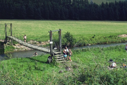 30 Aug 1987 · Aidan, Brett, Gary, Graham and Mark cool off at Ewes Water’s rickety suspension bridge.