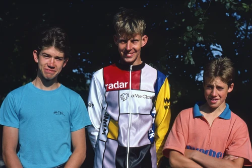 31 Aug 1987 · Graham, Mark and Brett outside Carlisle Youth Hostel, enjoying the sunshine.