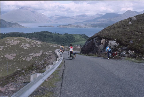 25 Aug 1988 · Tail-enders round A’ Bhainlir headland: Loch Shieldaig opening out, Upper Loch Torridon beyond.
