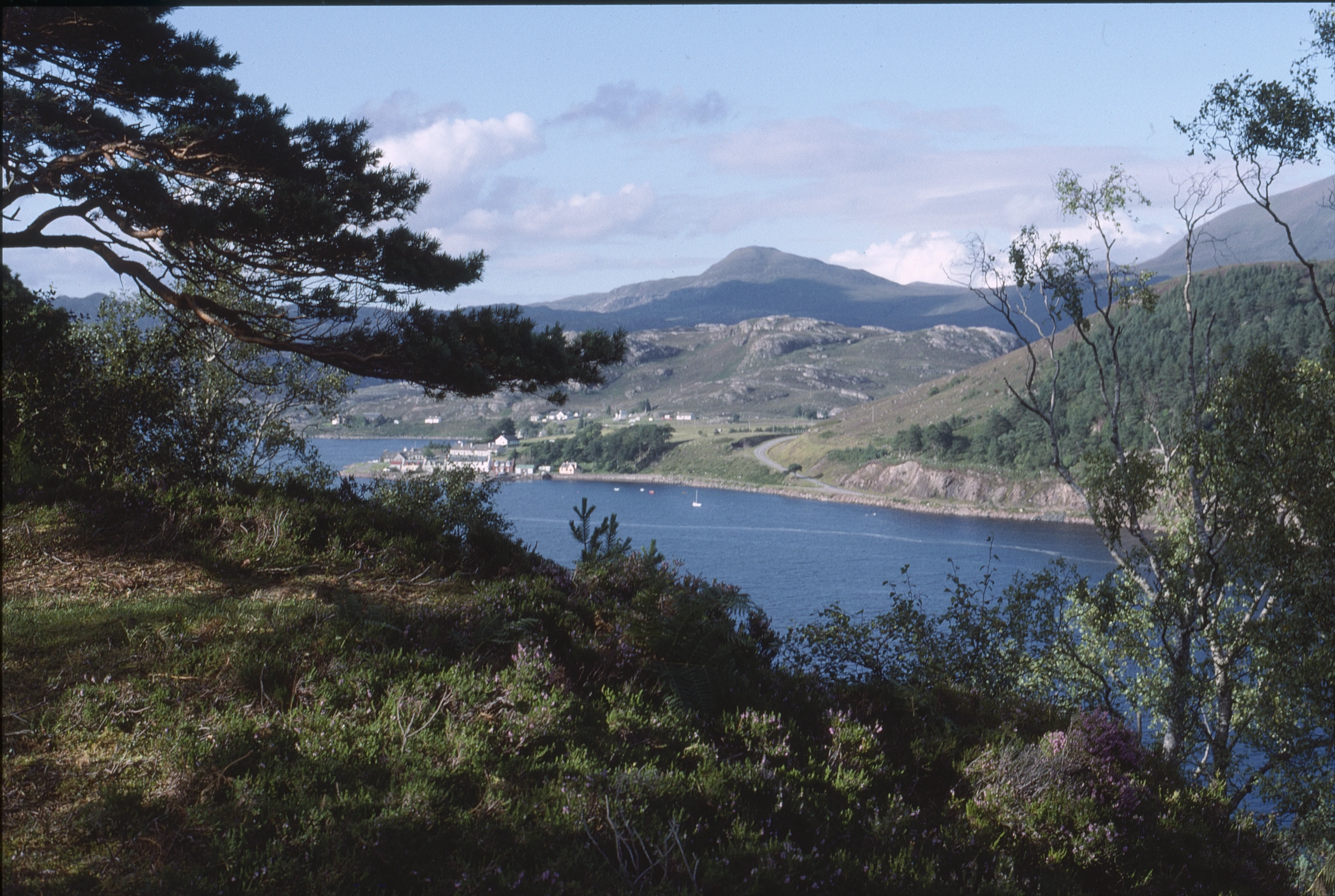 Shieldaig on its loch, from the coast road’s final run—twenty-four miles in.