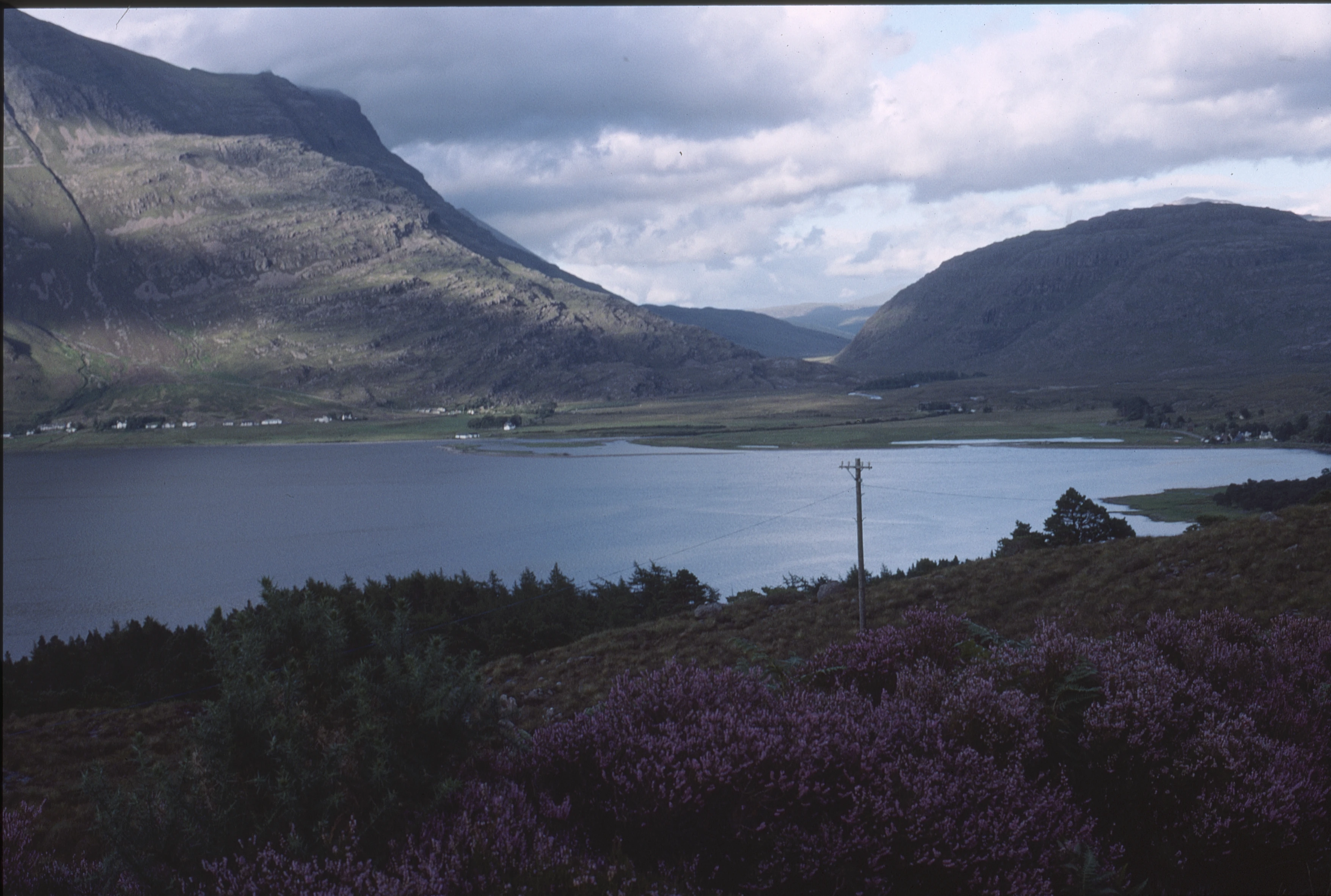 Torridon from the south-side viewpoint, modern youth hostel set back from the shore—30.5 miles in.