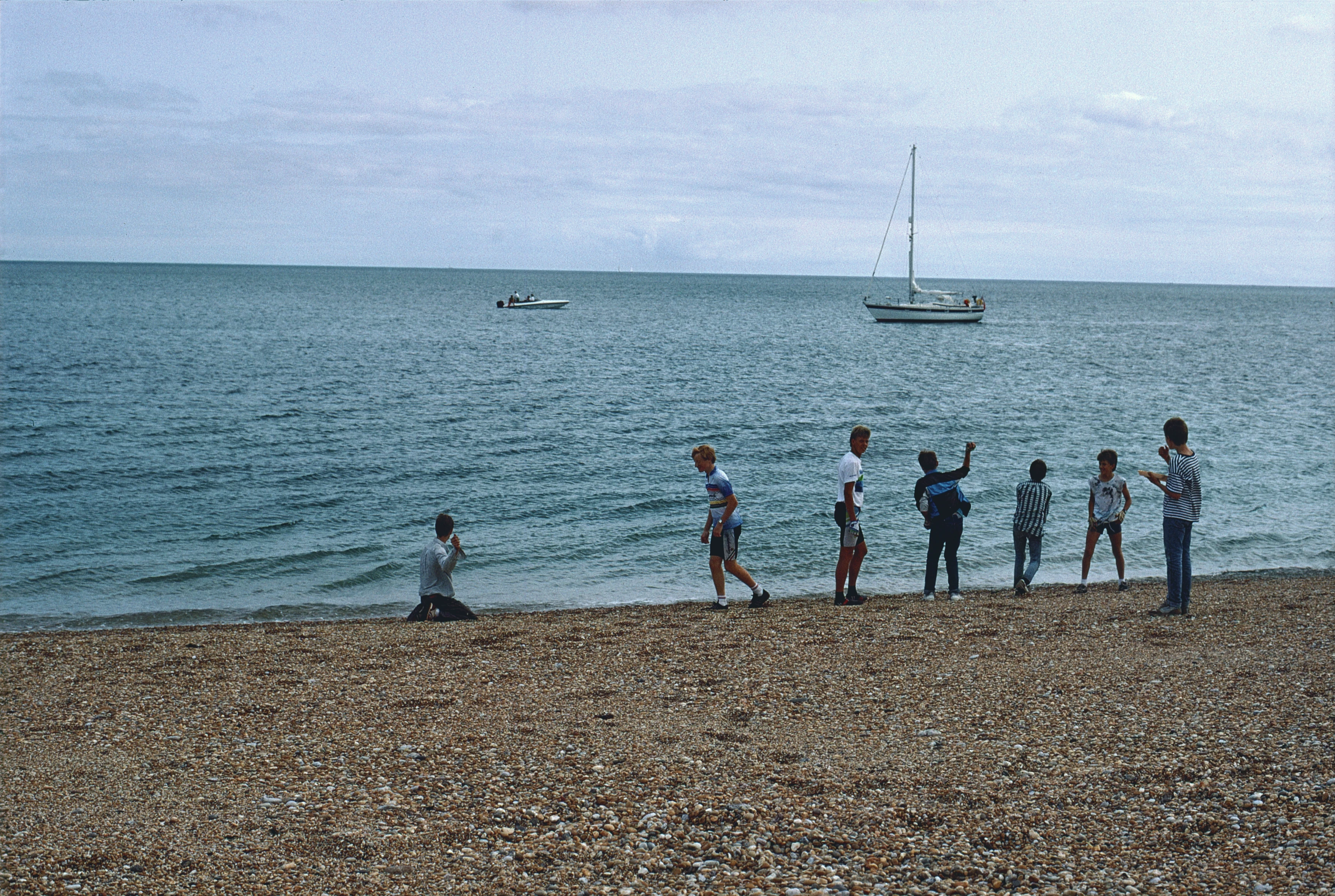 Youngsters enjoying the pebbles and lunch at the Torcross end of Slapton Sands.