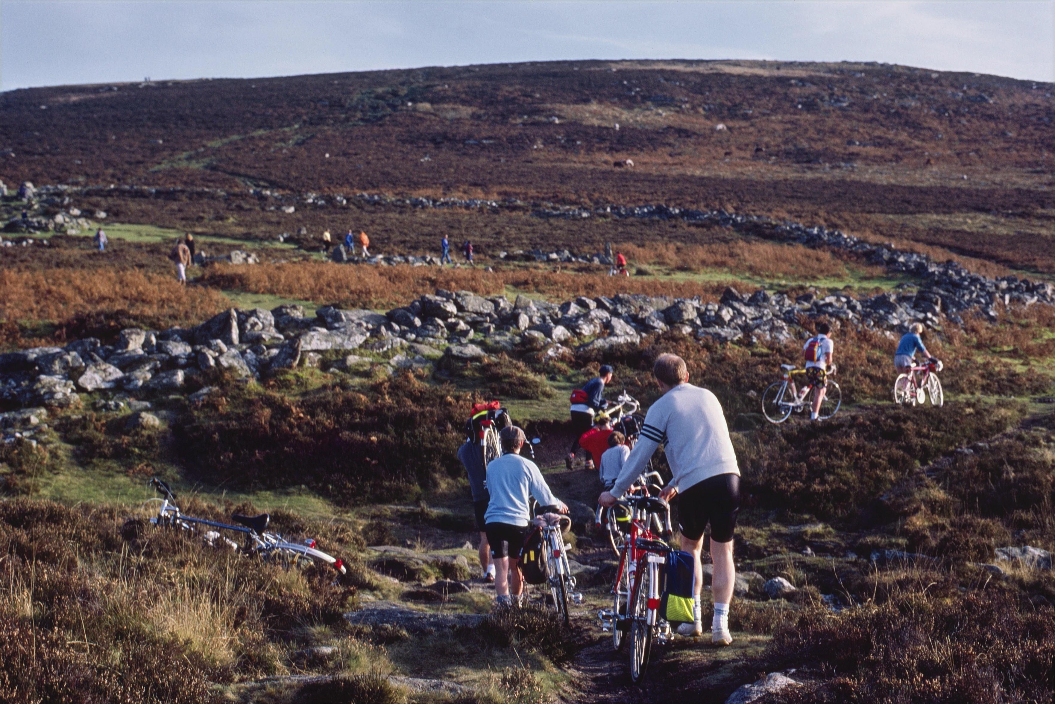 Ken and the others pick their way towards Grimspound and the climb beyond.