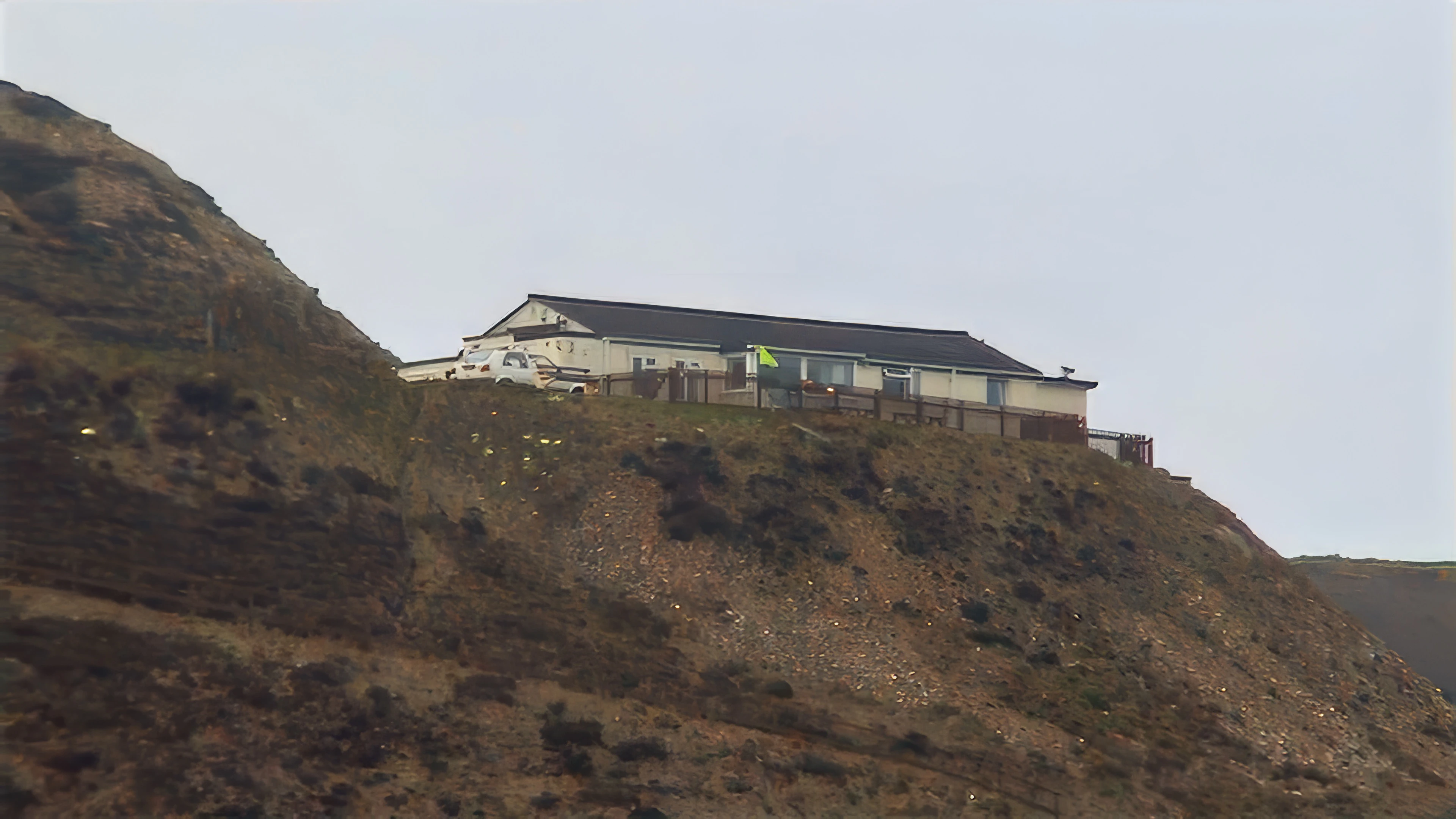 Looking back to Perranporth youth hostel from the beach.
