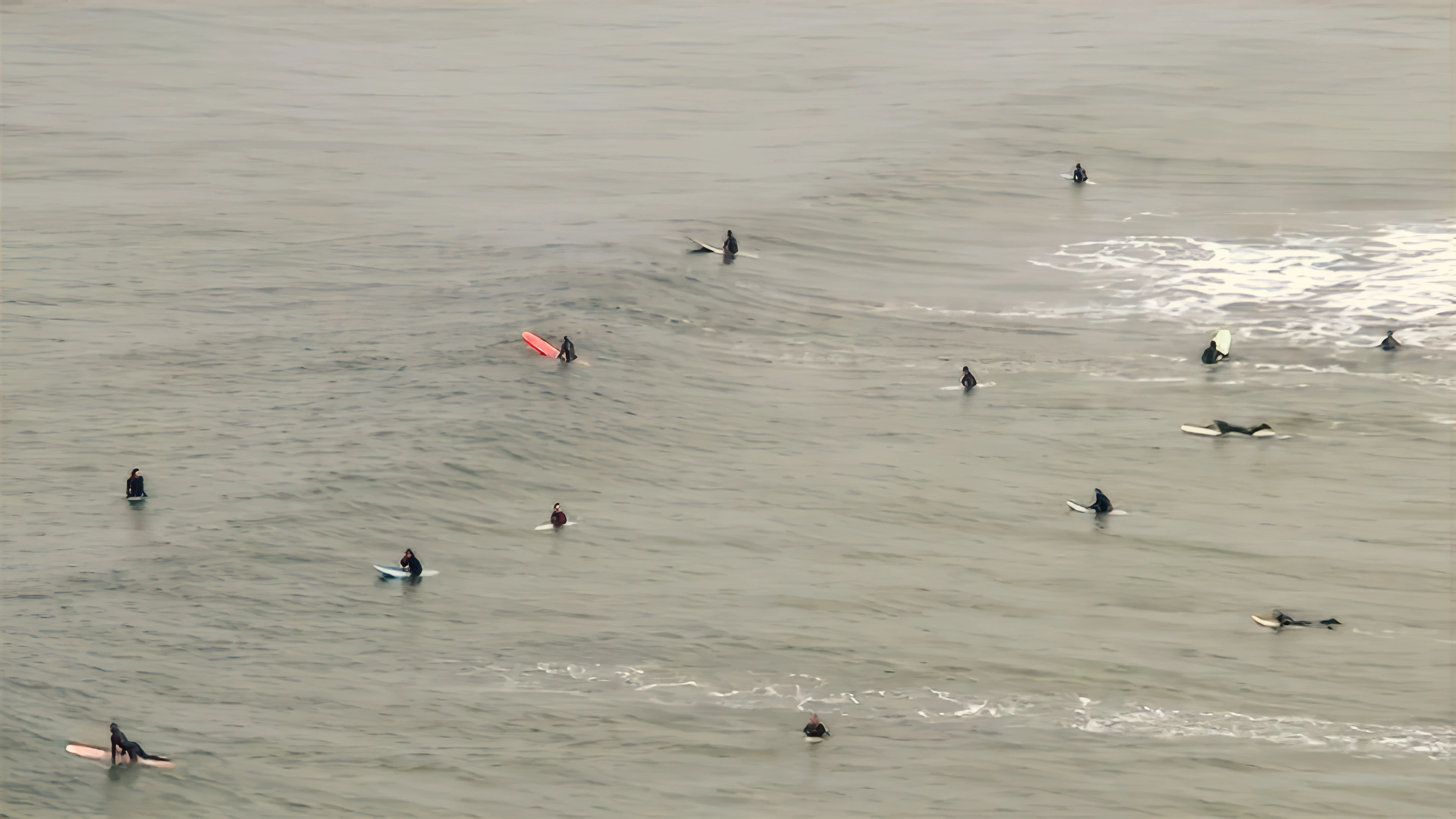 Loads of surfers at Perranporth, seen from near the hostel.