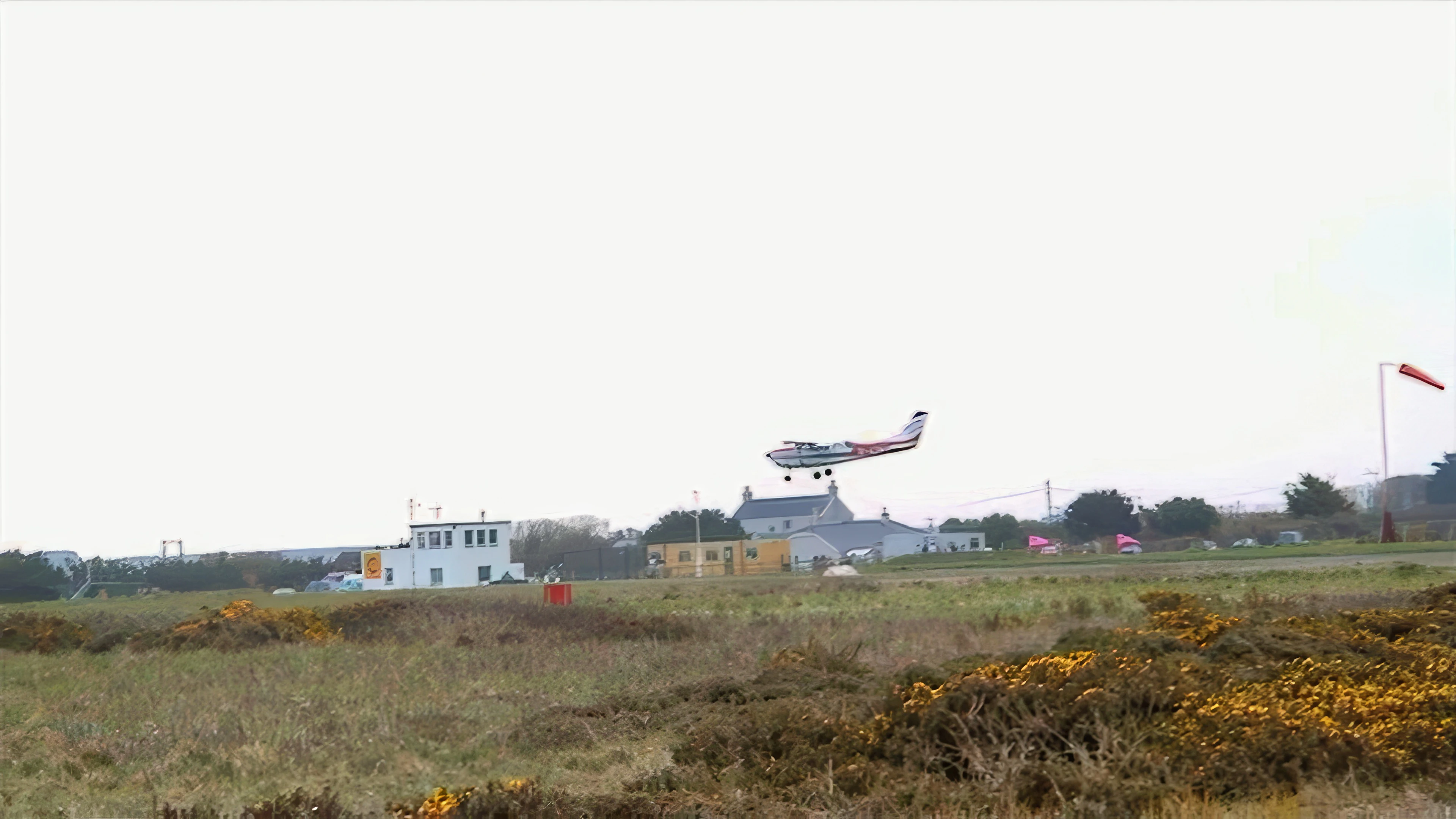 Light aircraft coming in to land at Perranporth Airport.