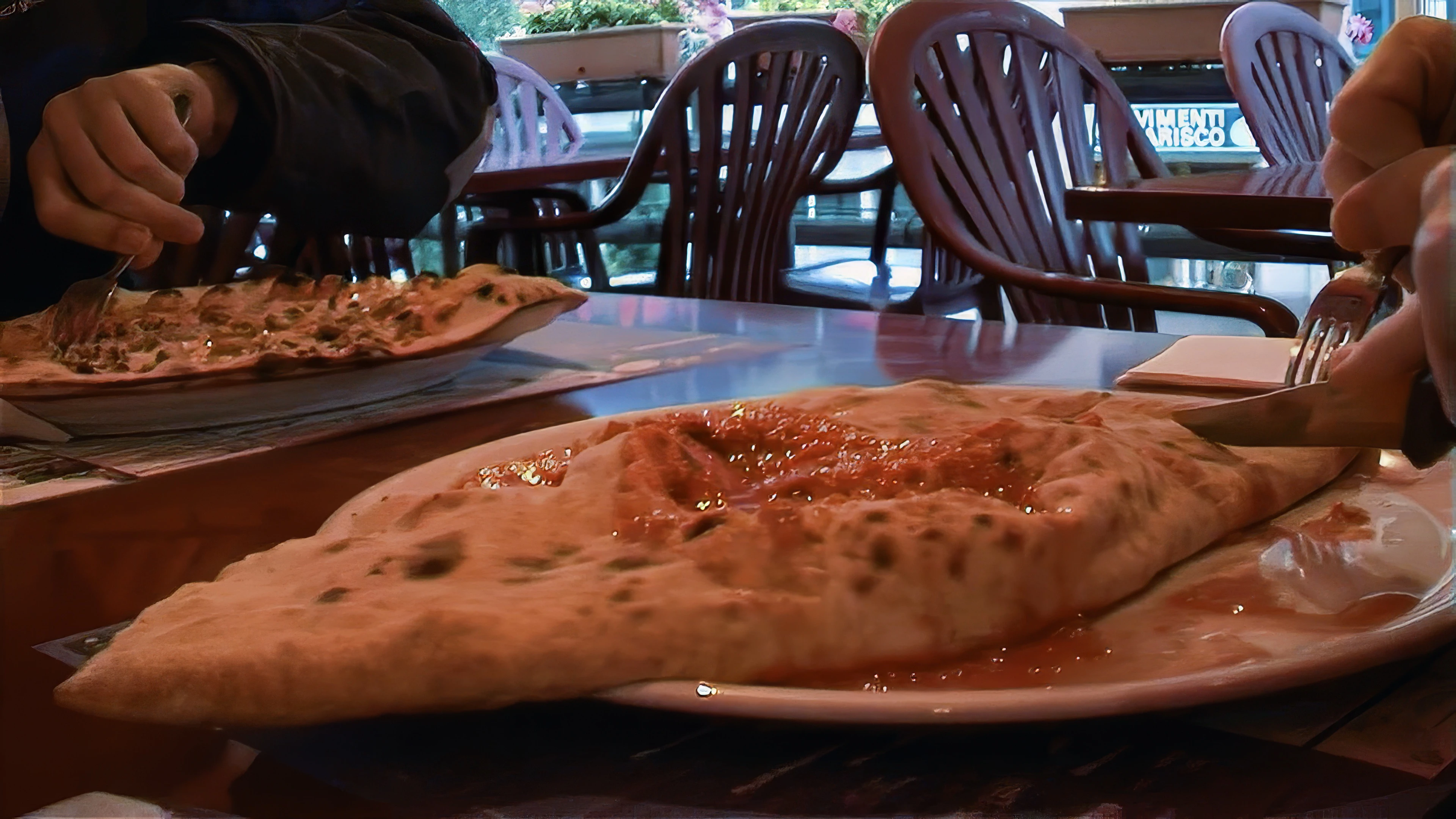Finally, our excellent pizzas arrive at Borelli’s, Airolo