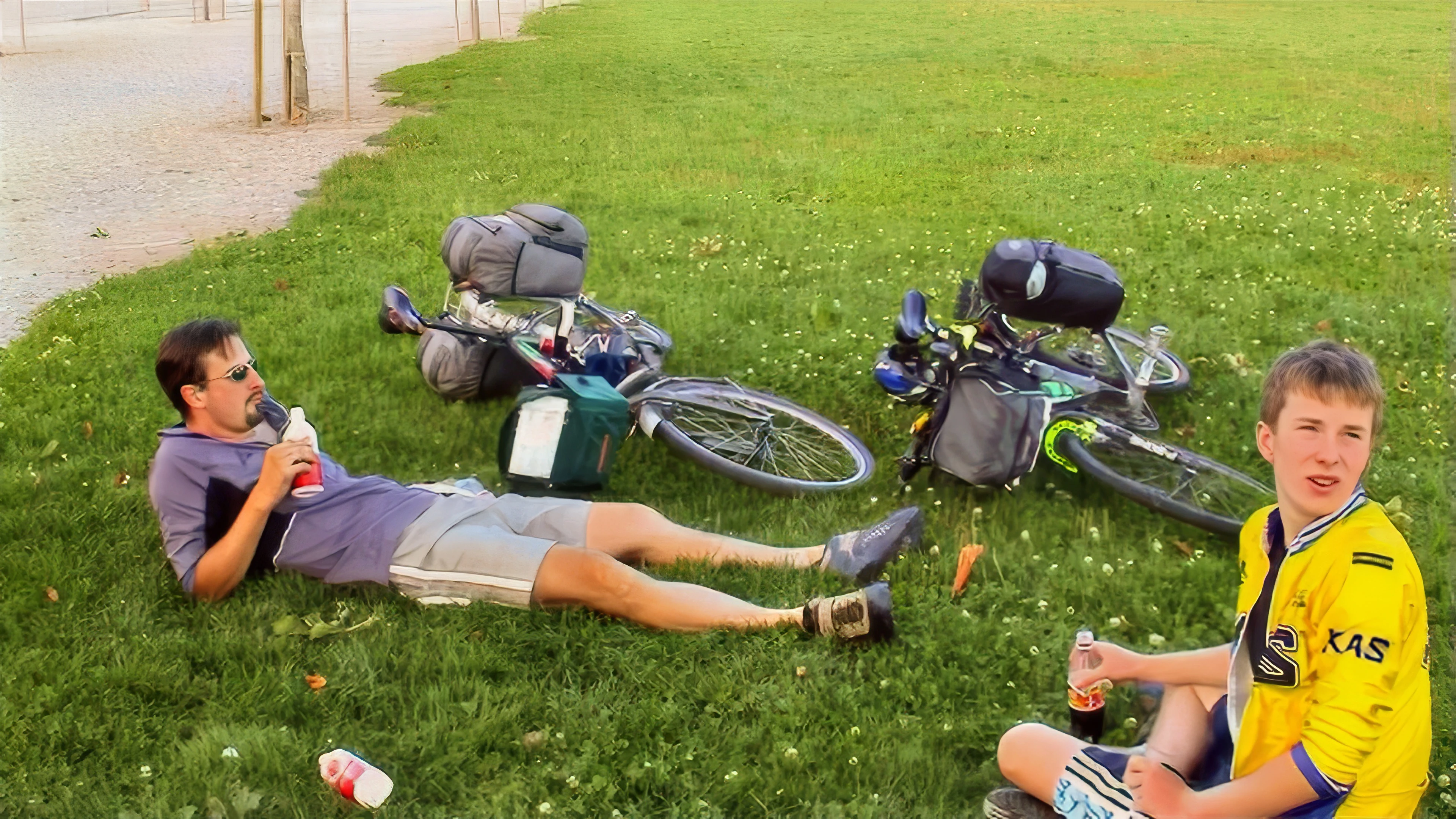Tao and Joe resting at Place d'Armes, Cully, 58.4 miles in.