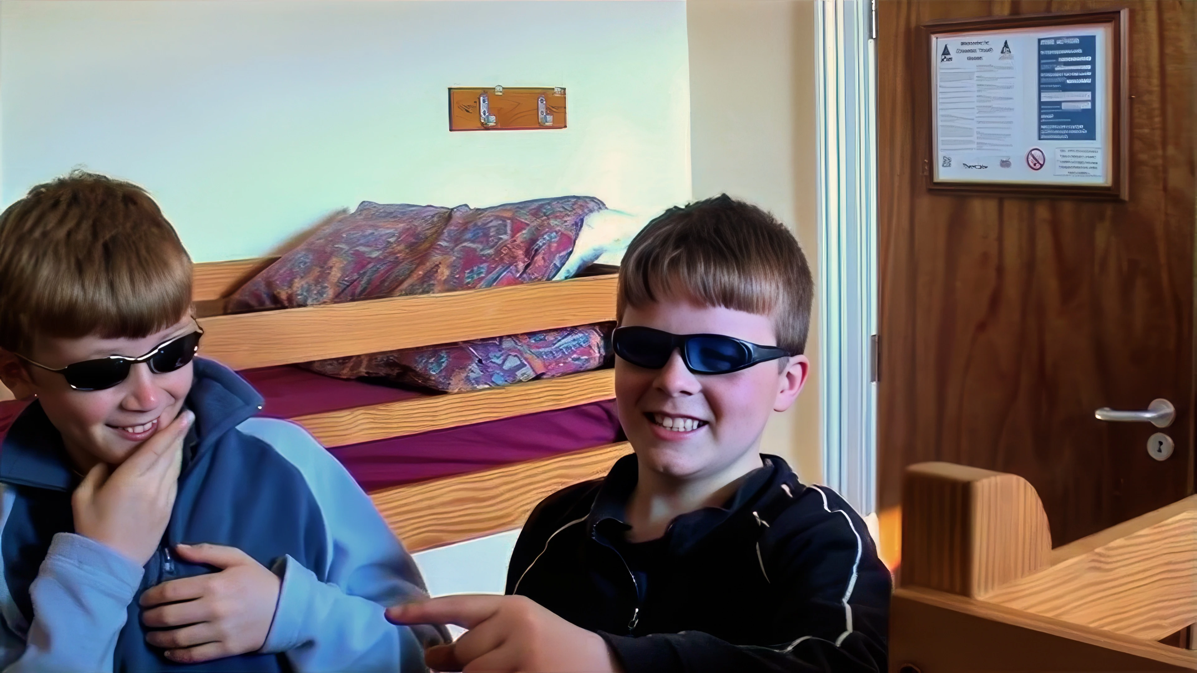 Ash leads a guided tour of Cheddar hostel.