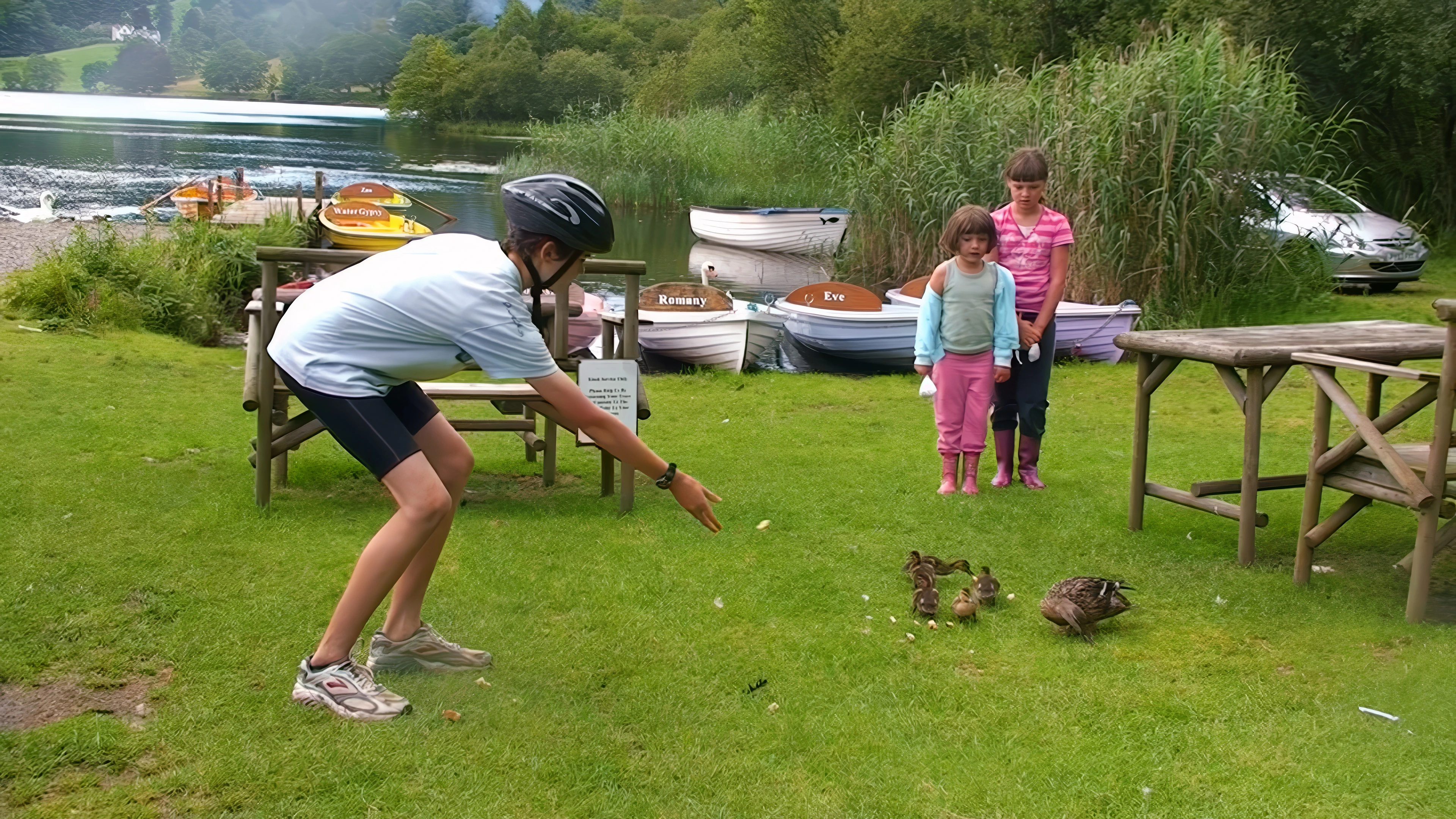 Freddie feeds the ducks while we await our Faeryland boats.