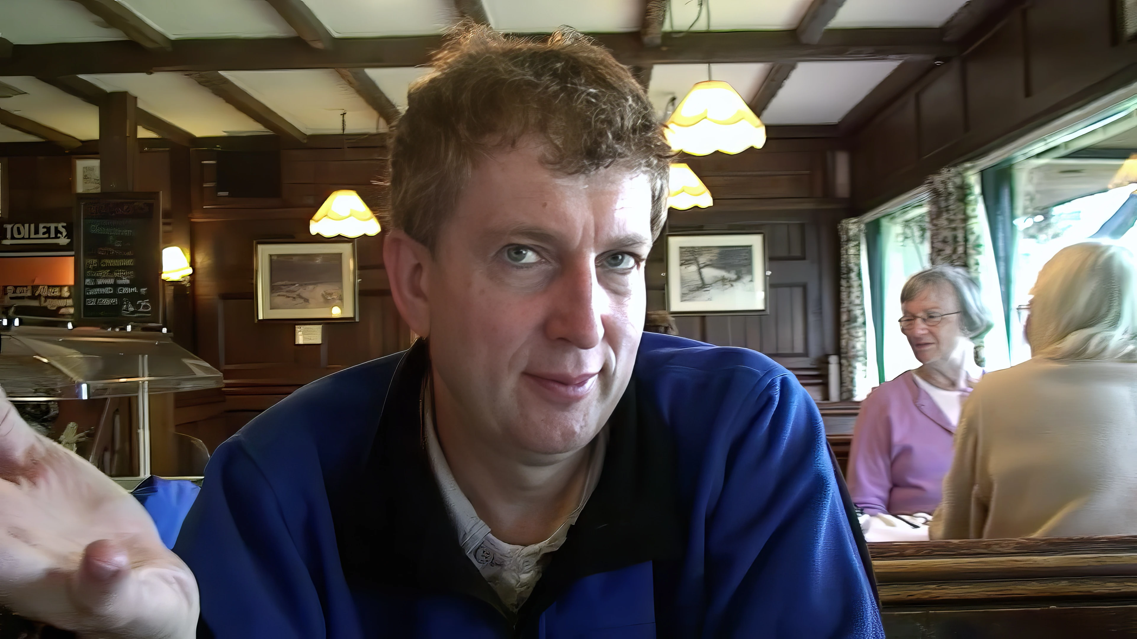 Michael politely demands his camcorder back at the Old Station House Inn.