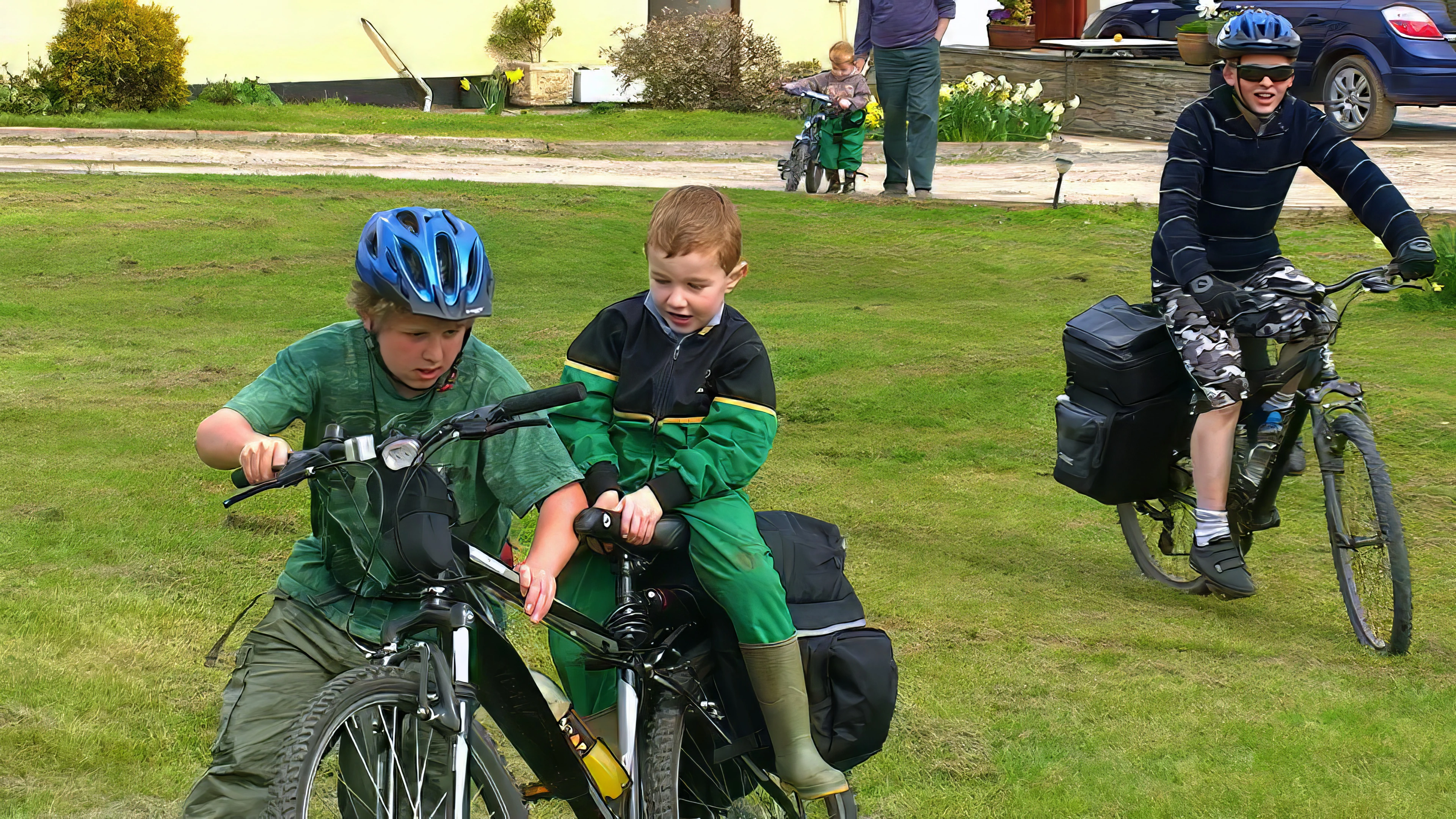 Matthew gives his young relative a ride at their Panborough farm