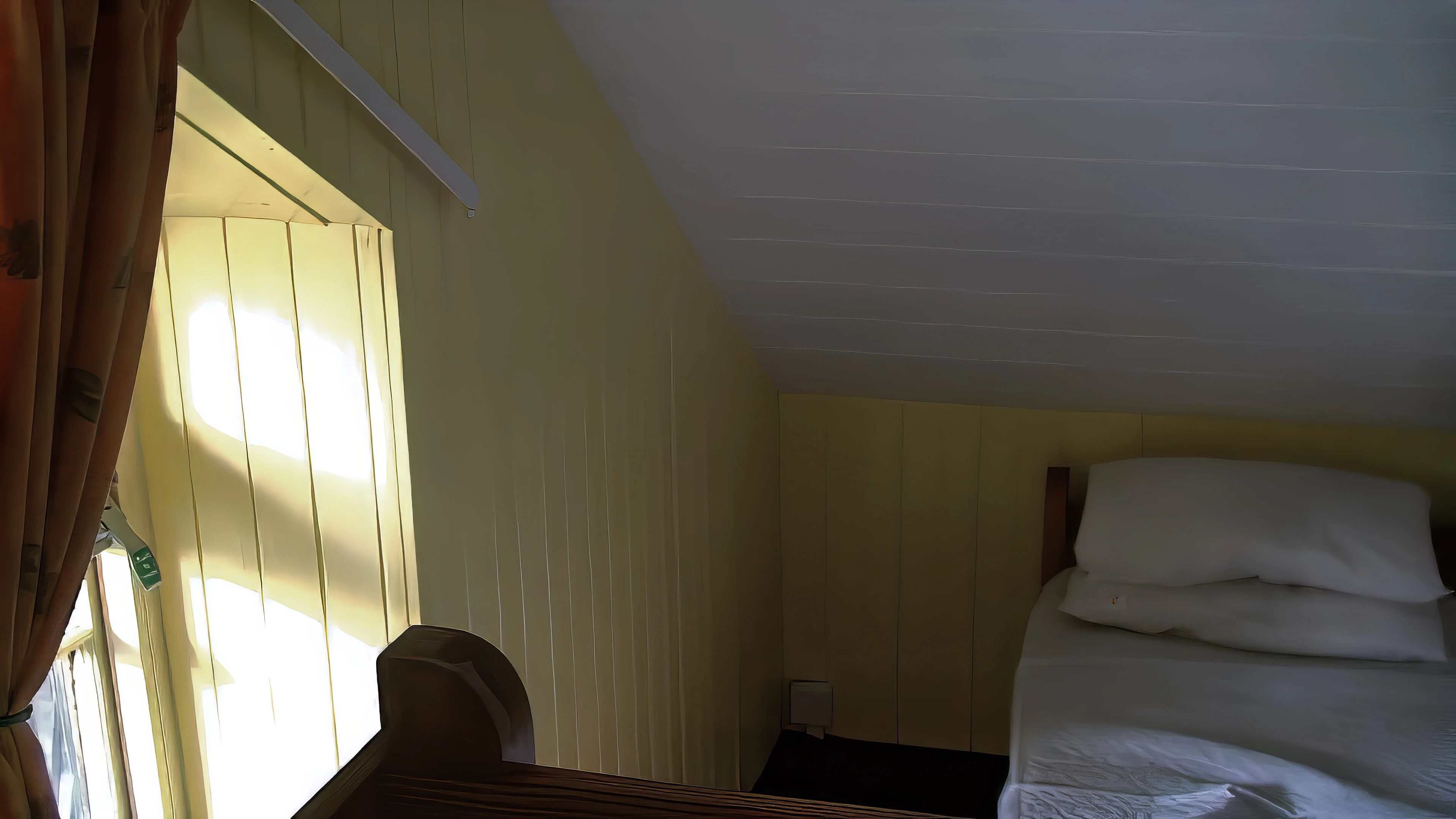 The larger attic dorm at Street Youth Hostel.
