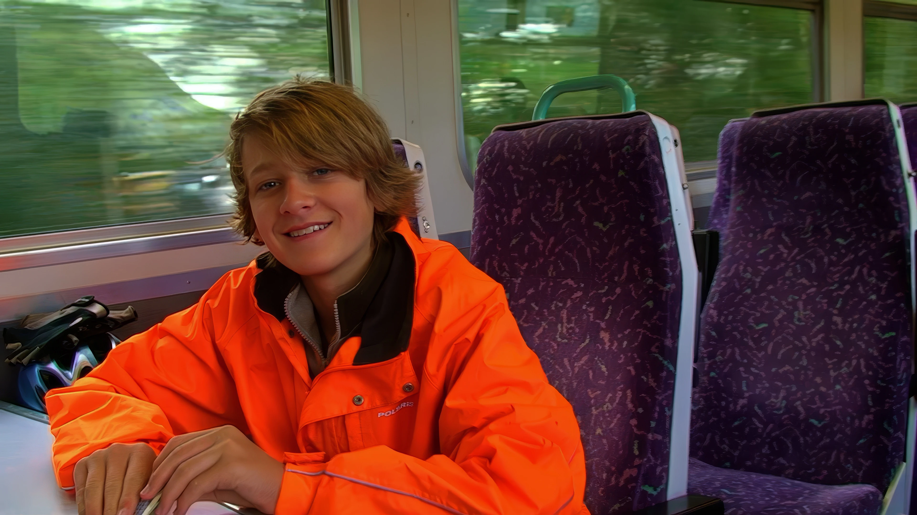 Hallam and Zac playing cards on the early Fort William-Mallaig train.