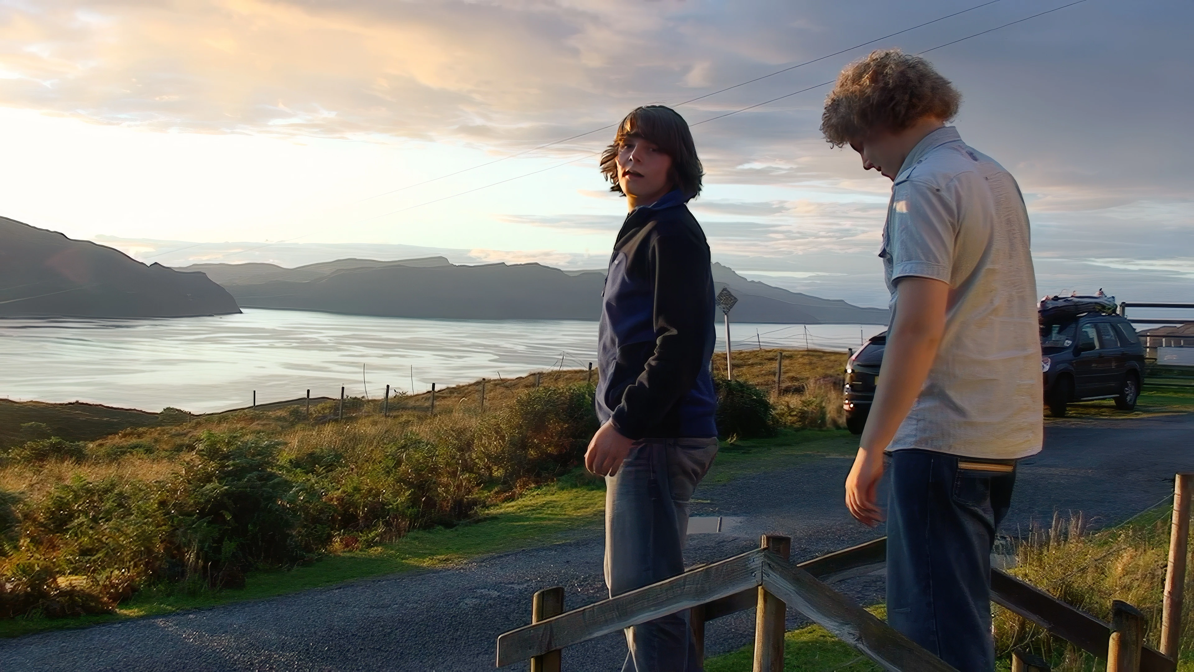 Ash and Ryan enjoy views from Raasay Youth Hostel across the Sound of Raasay to Skye.