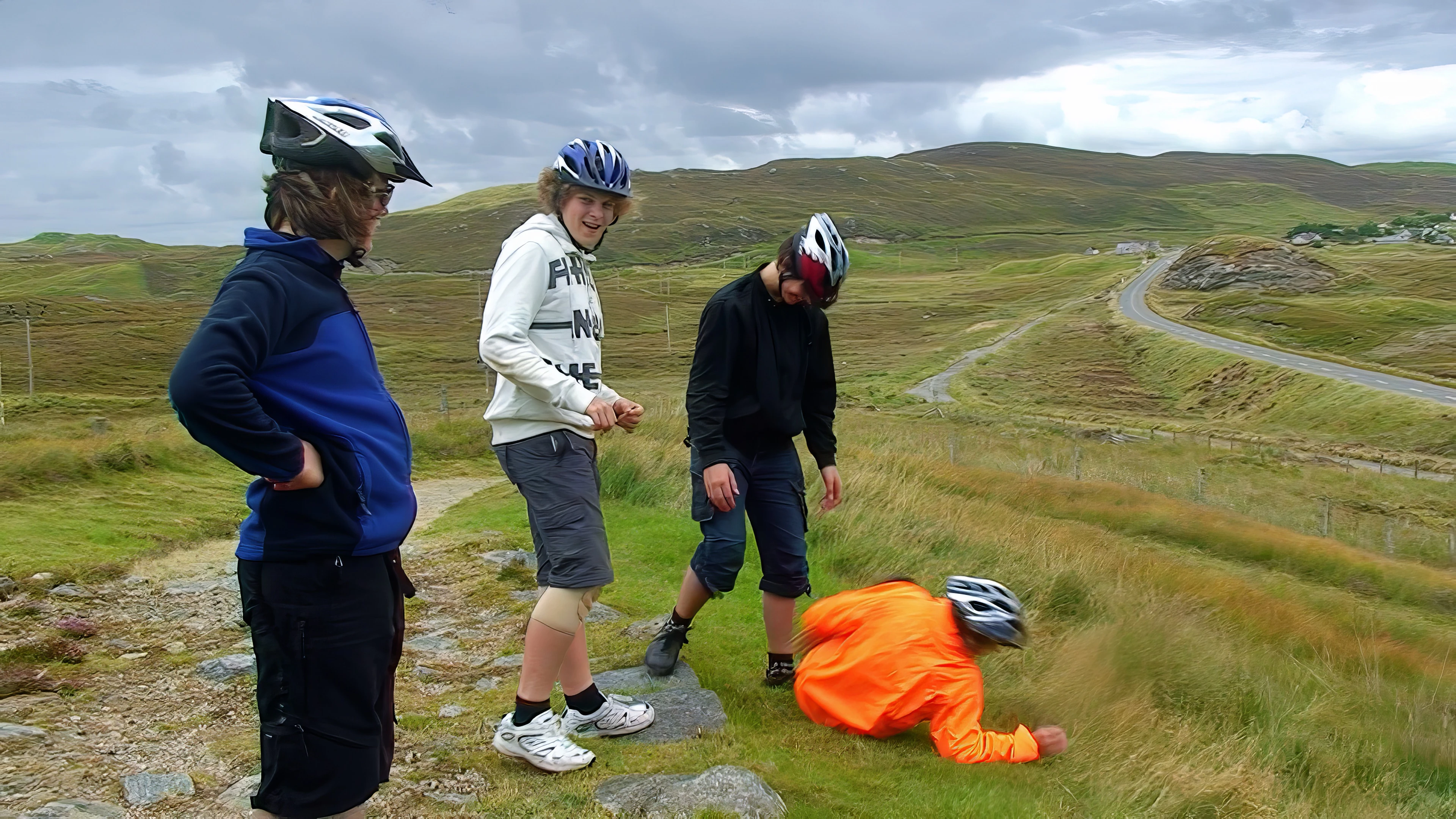 Hallam rolls down the hill beside the memorial.