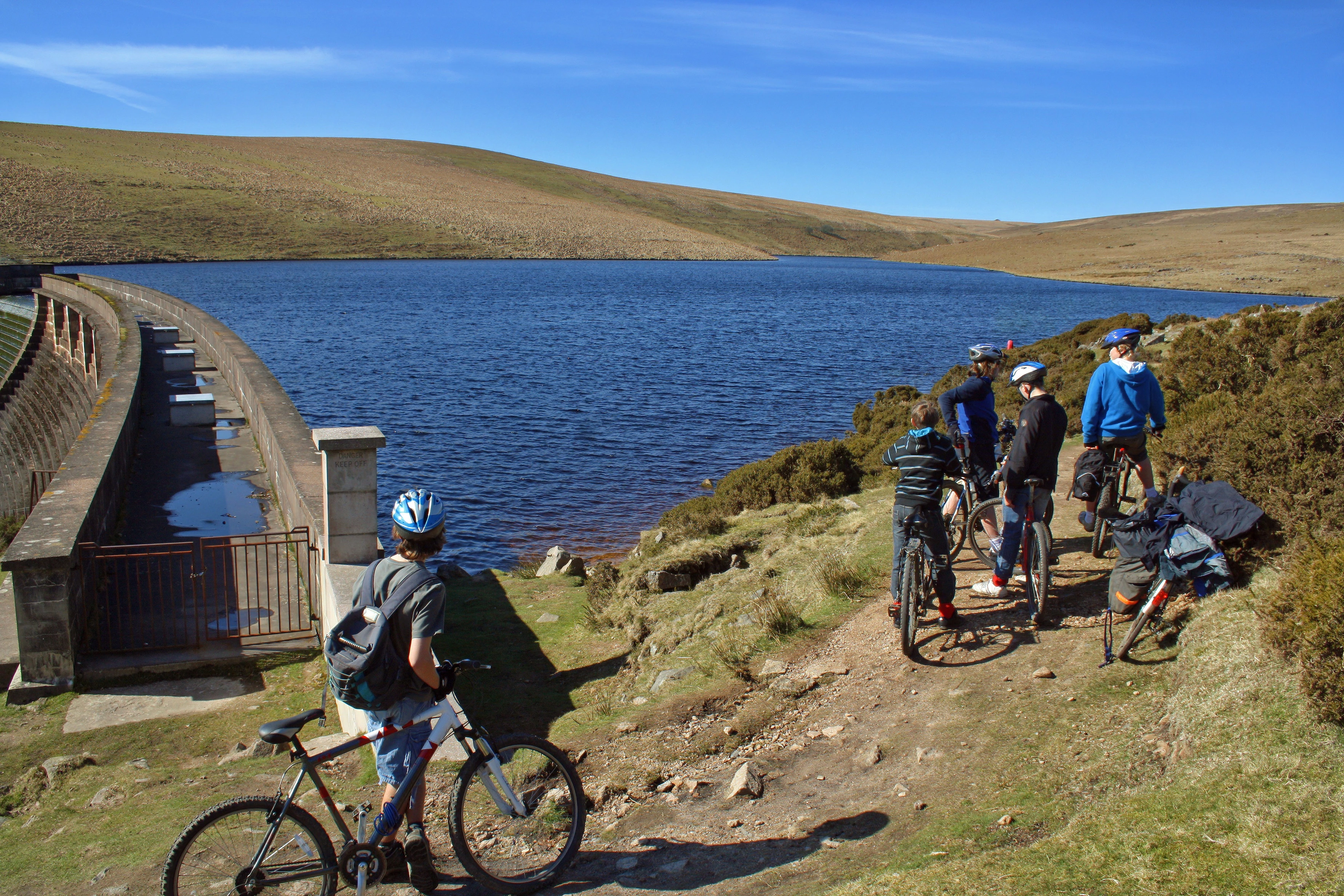 Avon Reservoir, mirror-calm in the sunshine.