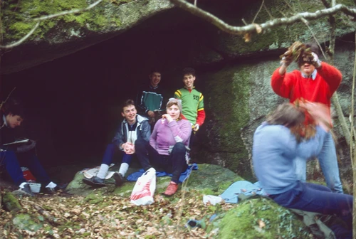 25 Jan 1987 · Lunch at the small cave deep in Lustleigh Cleave woods: Jason drops dead leaves on Luke as Martin, Graham, Gabrielle and John watch. Mark shows no interest.